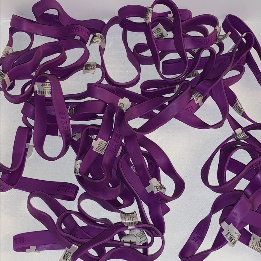 Lot of cancer support bracelets